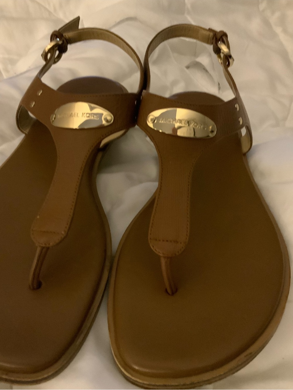 Michael Kors Brown Leather T-Strap Sandals with Gold Plaque